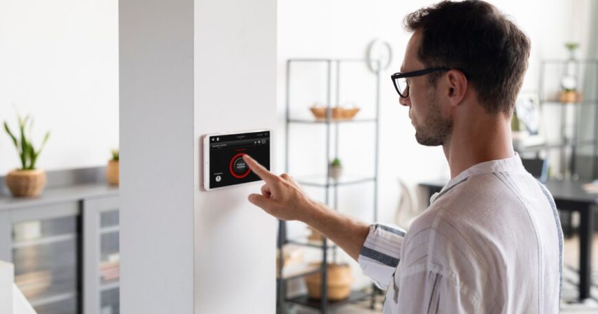 Modern security door with biometric scanner installed by access control system suppliers in UAE