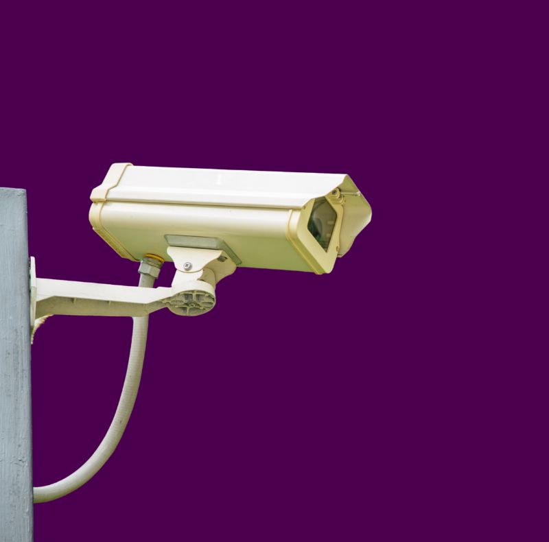 Fixed security cameras installed in a commercial facility supported by CCTV monitoring services in Dubai Media City for continuous surveillance.